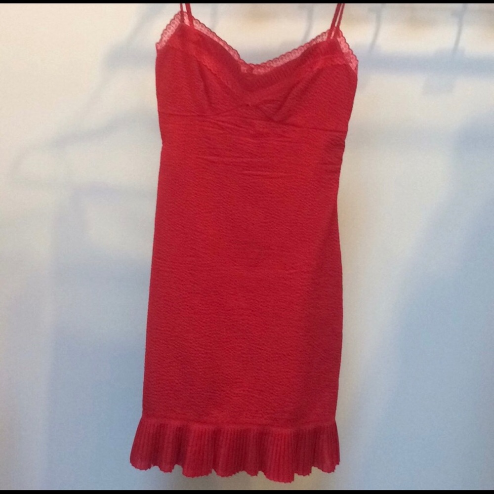 Red dress with lace and ruffled bottom.